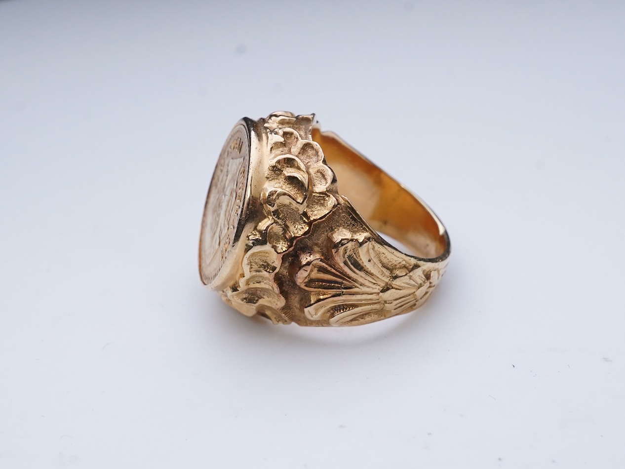 A gold peso coin ring